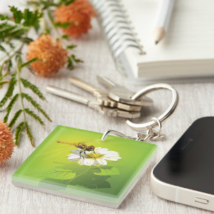 Porte-clés Dragonfly sur une fleur