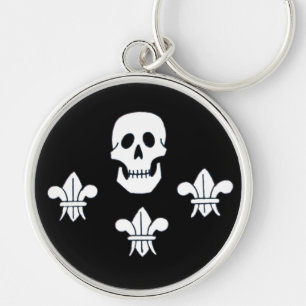 PORTE-CLÉS DRAPEAU JOLLY ROGER ET TROIS LIEUX