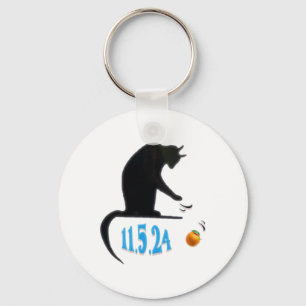 Porte-clés Drôle Chat Swatant Orange Off Table Sur La Date De