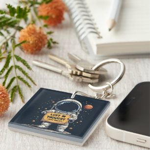 Porte-clés Drôle perdu dans la pensée astronaute l'illustrati