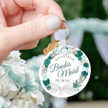 Porte-clés Élégant Mariage de couronne Turquoise florale Brid<br><div class="desc">Ces porte - clés sont conçus pour donner comme faveurs aux serveuses d'honneur à votre mariage. Elles sont décorées d'une aquarelle rustique peinte à la main avec une couronne de roses et de fleurs dans les tons turquoises, turquoise, aqua et cyan. Le texte est écrit en lettres de script élégantes,...</div>