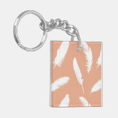 Porte-clés Empreinte de plumes blanches sur pêche douce (Devant gauche)