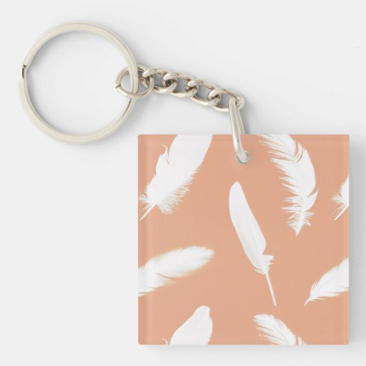 Porte-clés Empreinte de plumes blanches sur pêche douce (Devant)