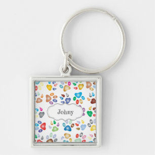 Porte-clés Empreintes de pattes de chien colorées adorables,