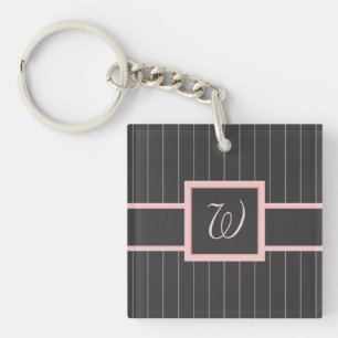 Porte-clés en acrylique noir avec rayures roses