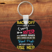 Porte-clés En Revanche, J'Ai Une Soeur Fou Qui S'Attaque À La (Recto)