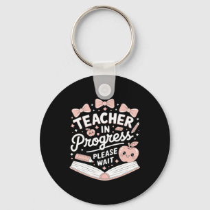 Porte-clés Enseignant en formation noeud papillon rose pomme