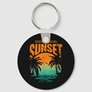 Porte-clés Entraînement Éternelle Poursuite du Coucher du Sol