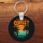 Porte-clés Entraînement Éternelle Poursuite du Coucher du Sol (Recto)