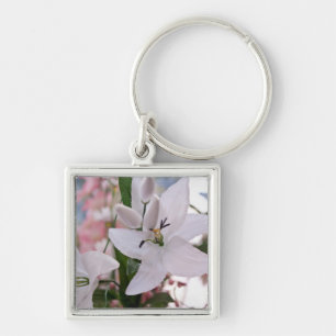 Porte-clés épousant le lis blanc fleurit les vignes d'amour