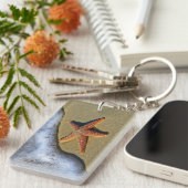 Porte-clés Estarfish orange sur la plage (Devant droit)