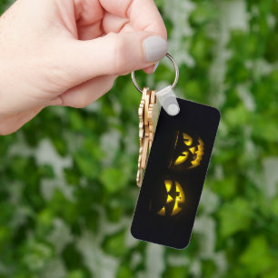 Porte-clés Face de citrouille jaune Eerie sur long noir