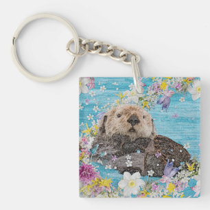 Porte-clés Fairytale Otter dans la rivière des Fleurs