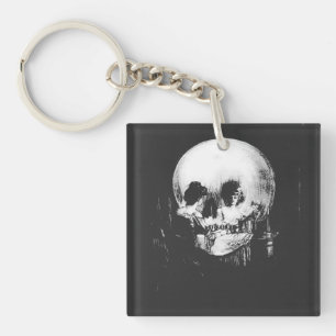 Porte-clés Femme avec reflet de crâne d'Halloween dans le mir