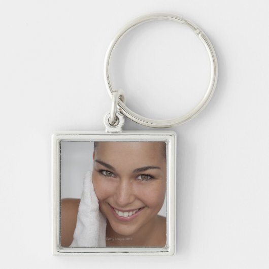 Porte-clés Femme frottant son visage avec un chiffon (Devant)