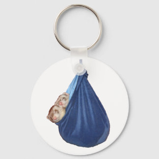 Porte-clés Ferrets Dans Un Porte - clé De Sac À Coucher