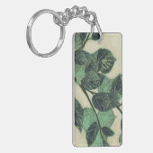 Porte-clés Feuilles et succursales sur Arrière - plan de crèm (Devant gauche)