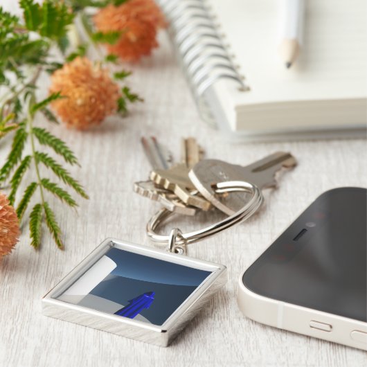 Porte-clés Figure dans le manteau bleu (Côté)