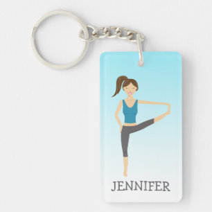 Porte-clés Fille de yoga en pose étendue de la main au pied e
