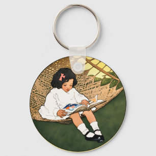 Porte-clés Fillette vintage lisant dans un hamac
