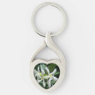 Porte-clés Fleur blanche de tubes de jasmin