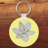 Porte-clés Fleur de lys blanche rayée dorée (Recto)