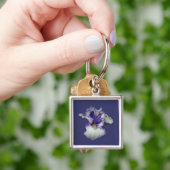 Porte-clés Fleur Iris à fond bleu et blanc (main)