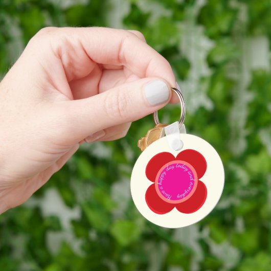 Porte-clés fleur sur (main)