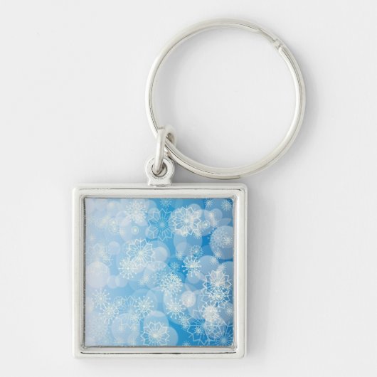 Porte-clés Flocons de Noël sur un fond bleu (Devant)