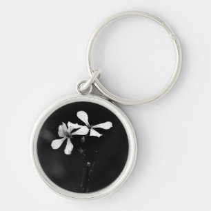 Porte-clés floral noir et blanc minimaliste