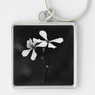 Porte-clés floral noir et blanc minimaliste