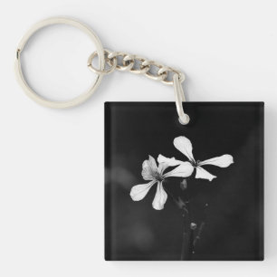 Porte-clés floral noir et blanc minimaliste