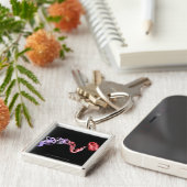 Porte-clés Foetus avec un cordon ombilical fait de brins (Côté)