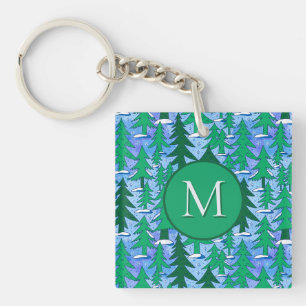 Porte-clés Forêt de sapins hivernale d'art naïf vert bleu