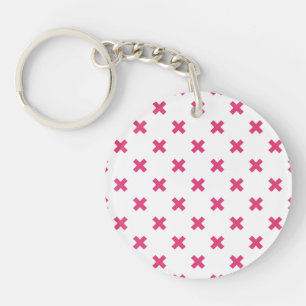 Porte-clés Fuchsia croix sur le blanc