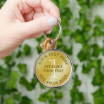 Porte-clés Gold medal first place champion de médallion<br><div class="desc">Médaille d'or premier champion gagnant médaillon métal porte - clé. Cadeau porte - clé personnalisé pour les numéros un, deux et trois. Prix d'or pour le 1er gagnant et les finalistes. Ajoutez votre propre texte personnalisé. Elégante idée cadeau pour vainqueur, gagnant du concours, champion de jeu, performance sportive, champion de...</div>