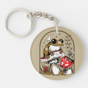 Porte-clés Grenouille sur un champignon sous un ciel éclairé