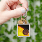 Porte-clés Gros plan d'une planète extrasolaire (main)