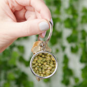 Porte-clés Gros plan sur des olives vertes (main)