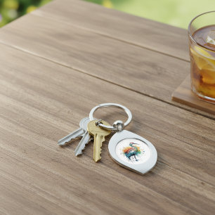 Porte-clés Grue colorée debout dans l'eau