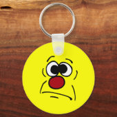 Porte-clés Grumpey face malchanceux (Recto)