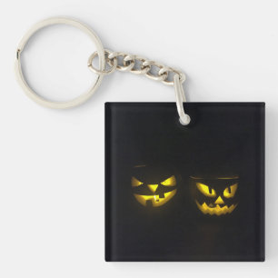 Porte-clés Halloween jaune brillant visage citrouille effraya