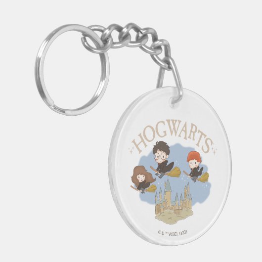 Porte-clés HARRY POTTER™, Hermione & Ron Fly Over HOGWARTS™ (Devant gauche)