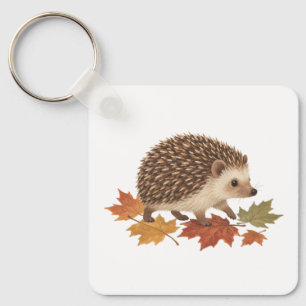 Porte-clés Hérisson parmi les feuilles d'érable tombées