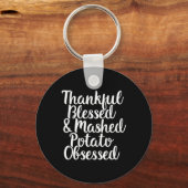 Porte-clés Heureux Bienheureux et purée de pomme de terre Obs (Recto)