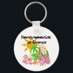 Porte-clés Honeymooning in Cancun<br><div class="desc">Destination honeymoon Cancun T-shirts,  hoodies,  sweatshirts,  tank tops,  and more with flip flops and tropical plant design,  perfect for the new bride and groom who will be honeymooning in Cancun!</div>