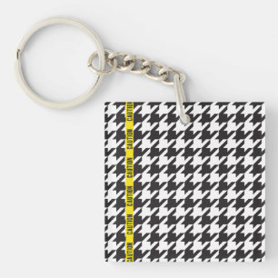 Porte-clés Houndstooth enveloppé dans la prudence