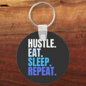 Porte-clés HUSTLE Bleu.EAT.SOMMEZ. RECOMMENCER. (Recto)
