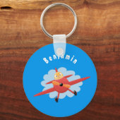 Porte-clés Illustration d'un avion rouge volant mignon (Recto)