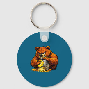 Porte-clés Illustration d'un ours en colère râpant une râpe à